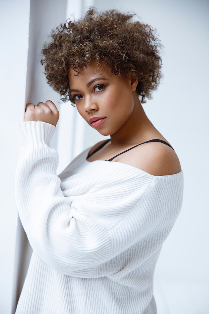 Danielle Nash, plus size model at Ms Curvaceous UK, photographed against a white studio wall