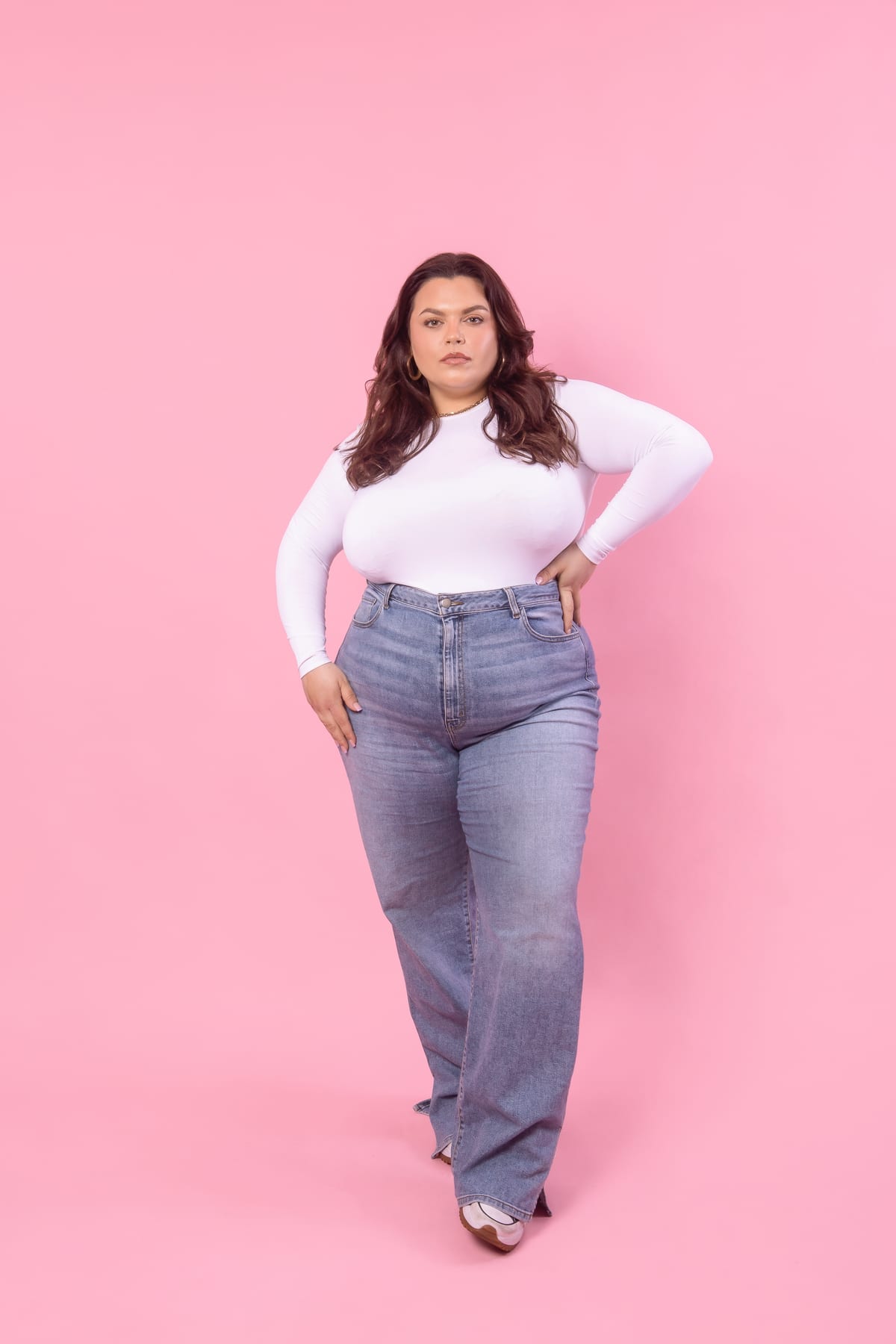 Full length studio shot of a plus size model