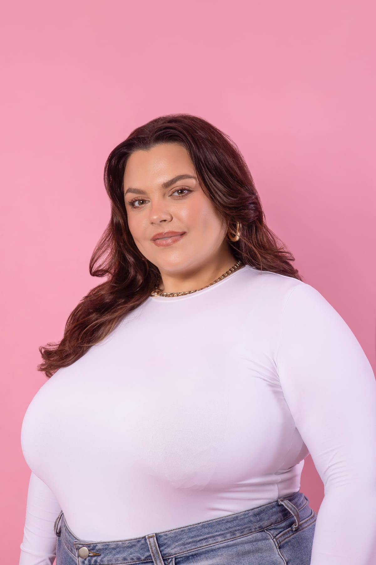 Three-quarter studio shot of a plus size model